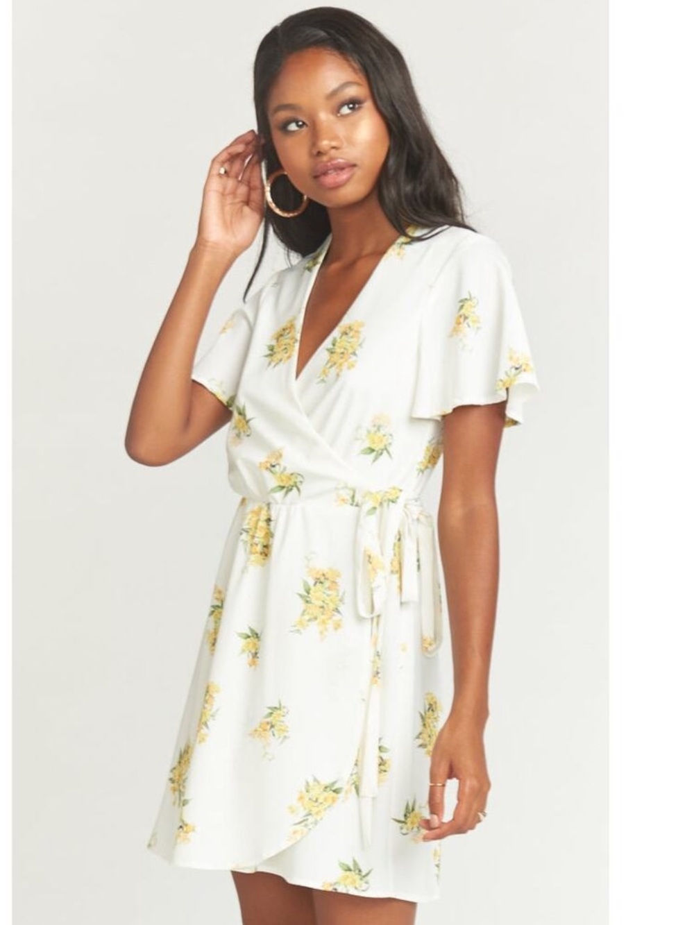 Show Me Your Mumu Andrea Floral
Print Mini Wrap Dress White
Yellow Small